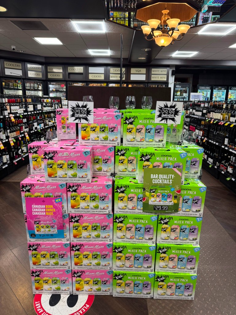 Black Fly cocktail mixer packs display