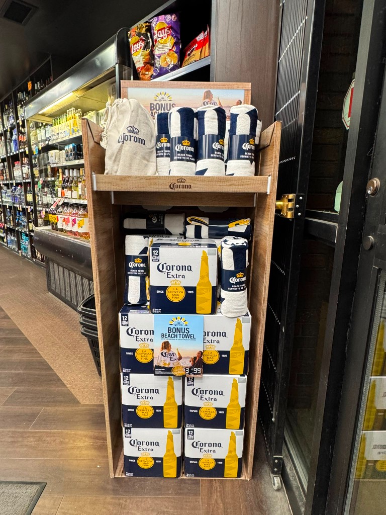 Corona Extra display with bonus beach towel